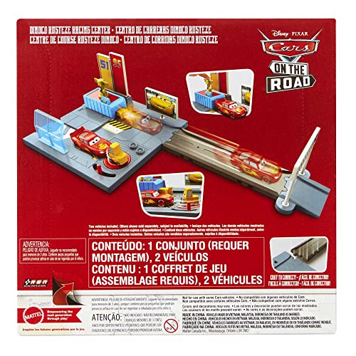 Disney and Pixar Cars On The Road Dinoco Rusteze Racing Center Playset with Lightning McQueen Toy Car, Launcher, Short Track and Spinning Pitty, Toy Gift for Kids, HGV69